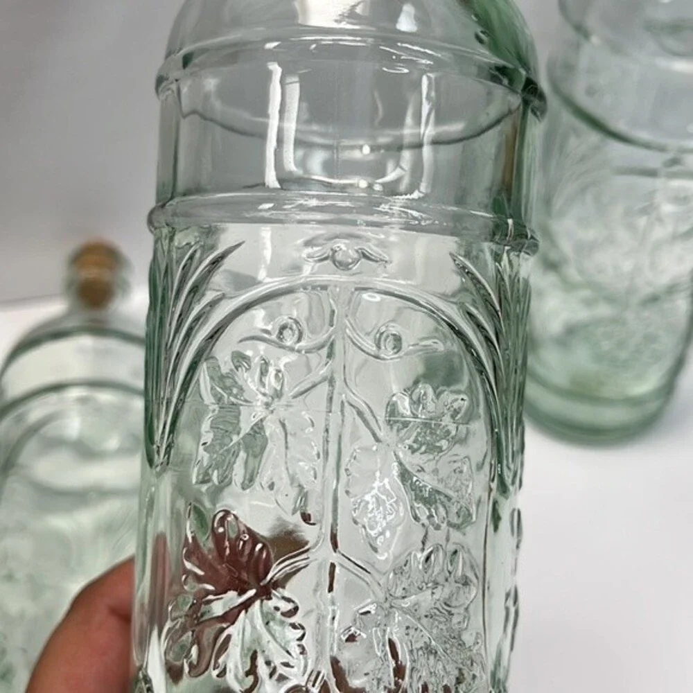 William Sonoma made in Spain Embossed Clear Green Glass Bottles set of 3